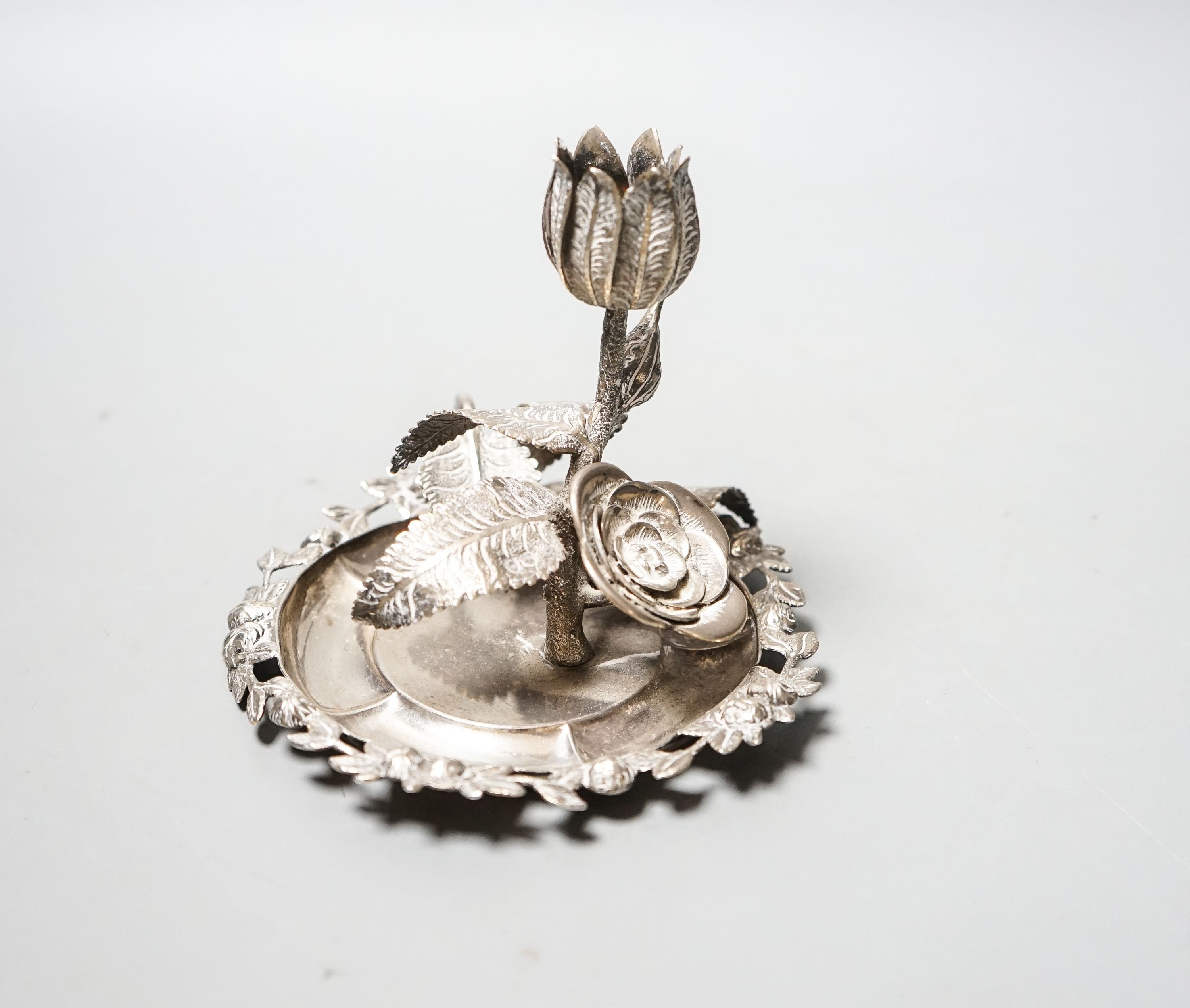 A George IV silver ‘rose’ chamberstick by Sampson Mordan and George Riddle, London, 1829, diameter 11.5cm, 186 grams.